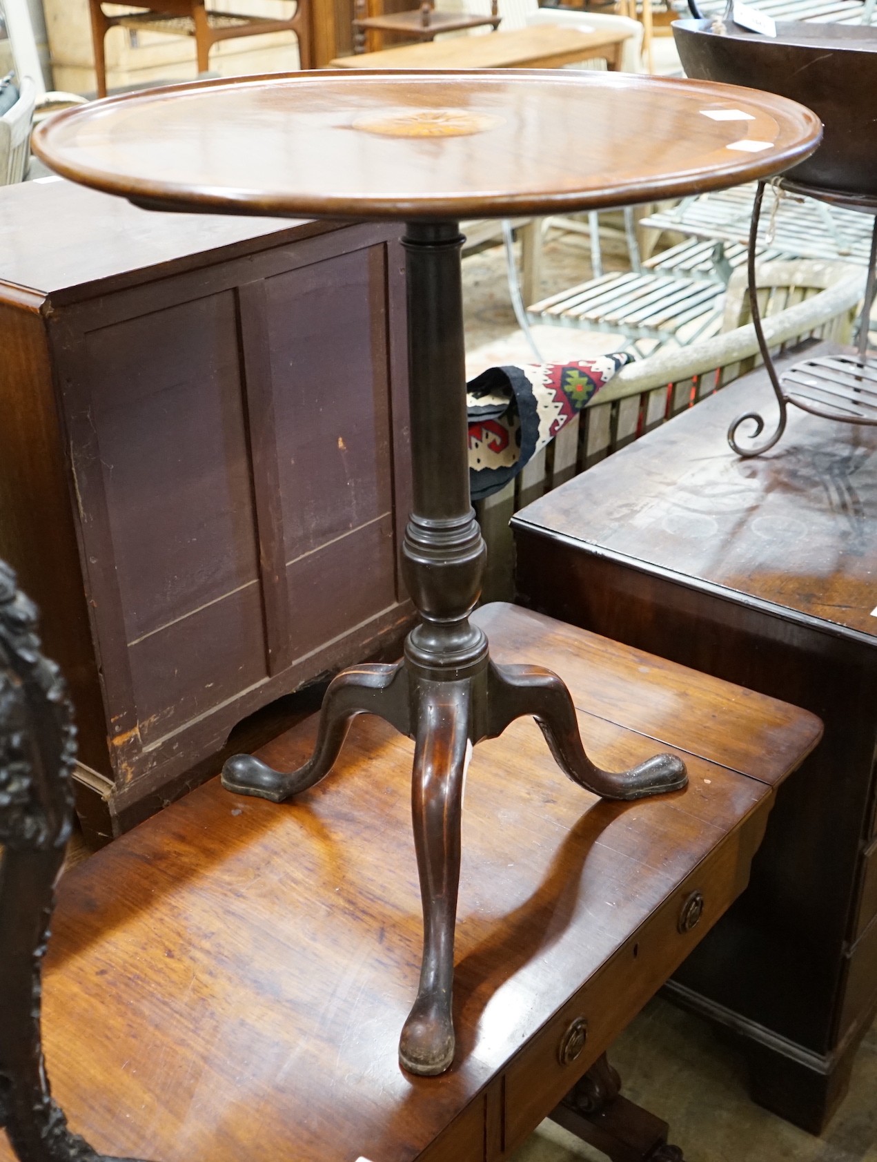 A George III and later circular inlaid mahogany tilt top tripod table, diameter 59cm, height 71cm